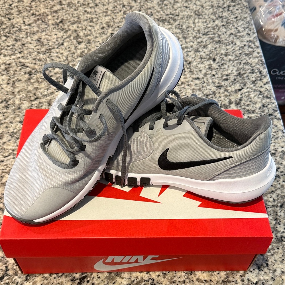 Nike Gray and White Sneakers with Black Swoosh